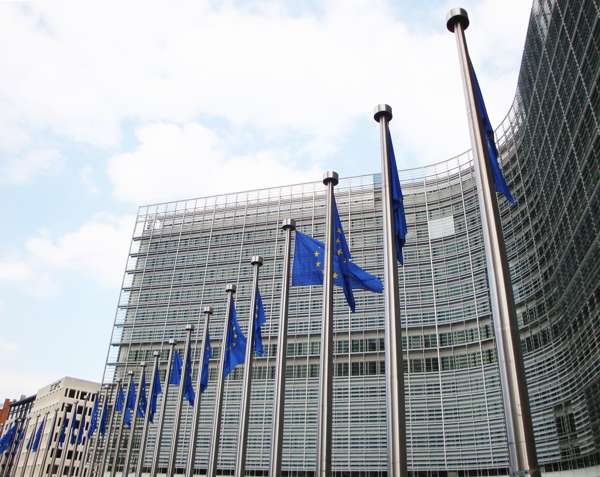 Brussels European institutions quarter building with flags